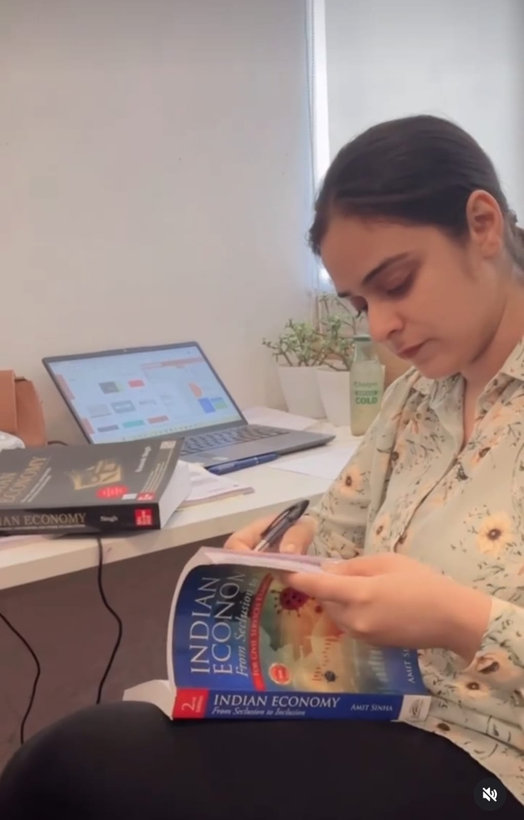 Dr. Nanki Sharma teaching economics in classroom